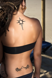 bigstock-Girl-with-tattooed-back-8245193