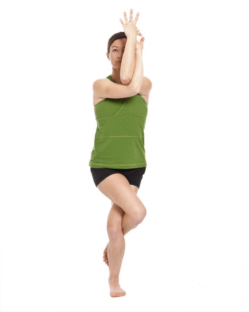 bigstock-woman-doing-yoga-eagle-positi-29324759