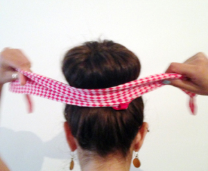 To give it more of a funky look, you can wrap the bun around with a scarf.